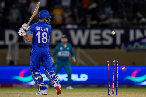 Ibrahim Zadran is bowled by Matt Henry